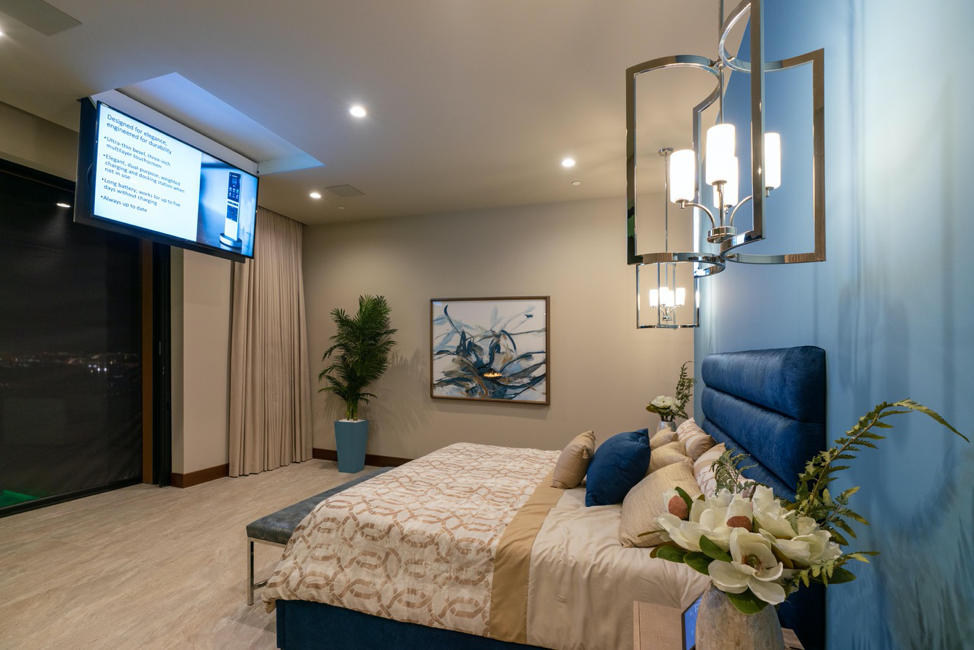 Master bedroom with concealed TV in ceiling